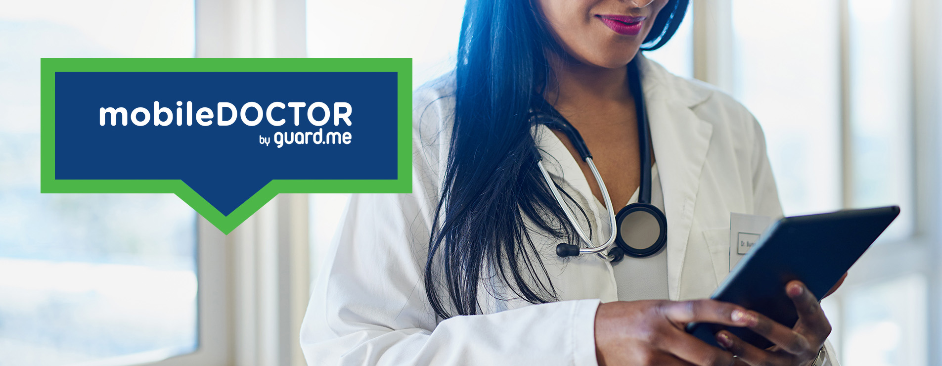 Photo of female doctor using her tablet